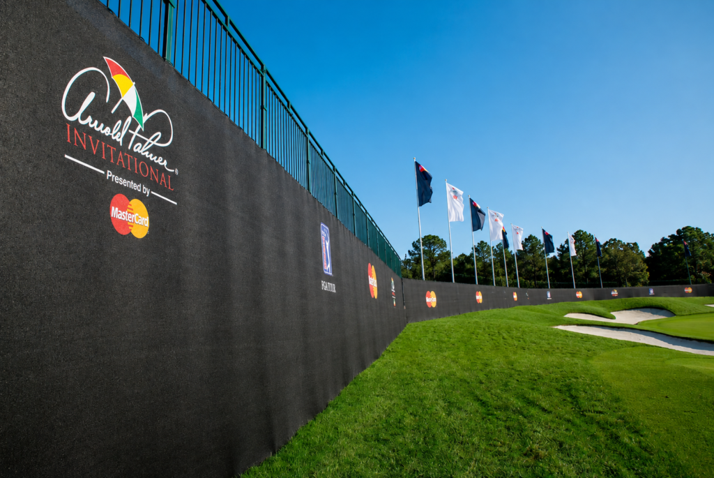 Custom branded event mesh wrap at the Arnold Palmer Invitational golf tournament in Orlando, Florida